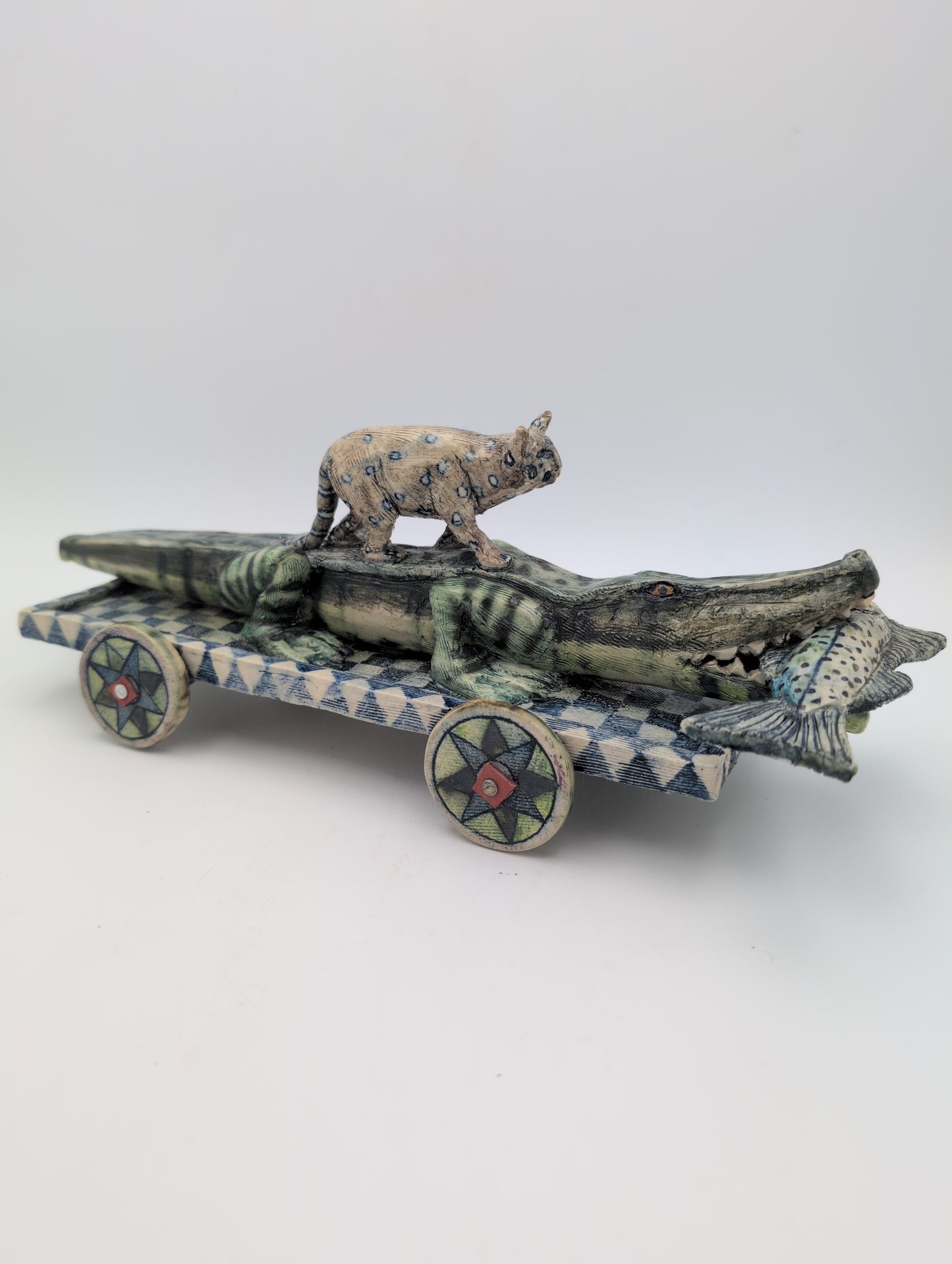 "The Fish Eaters" ceramic sculpture
