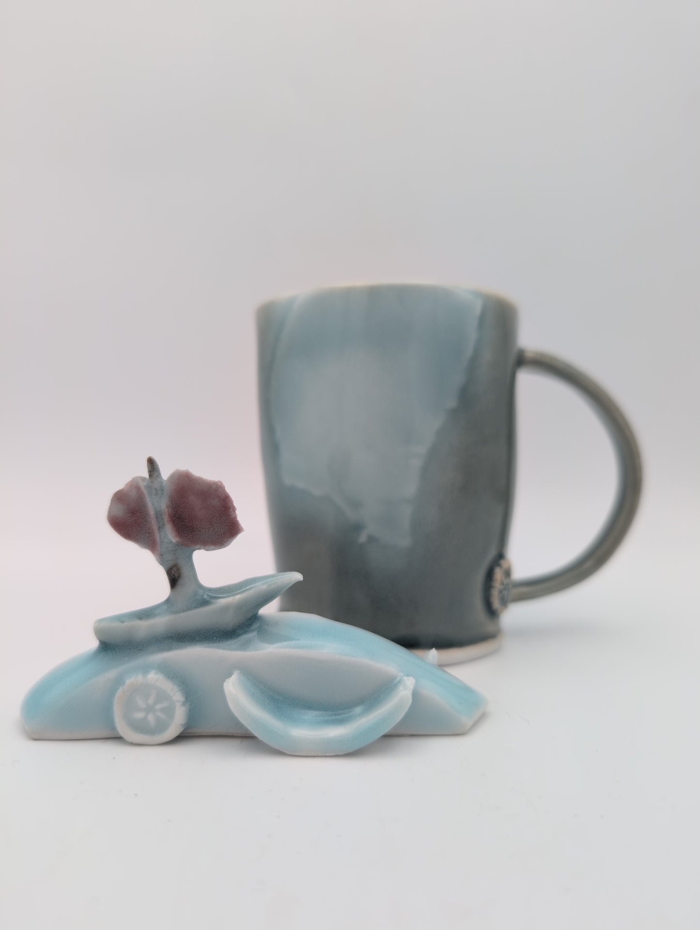 Porcelain boat and waves small sculpture