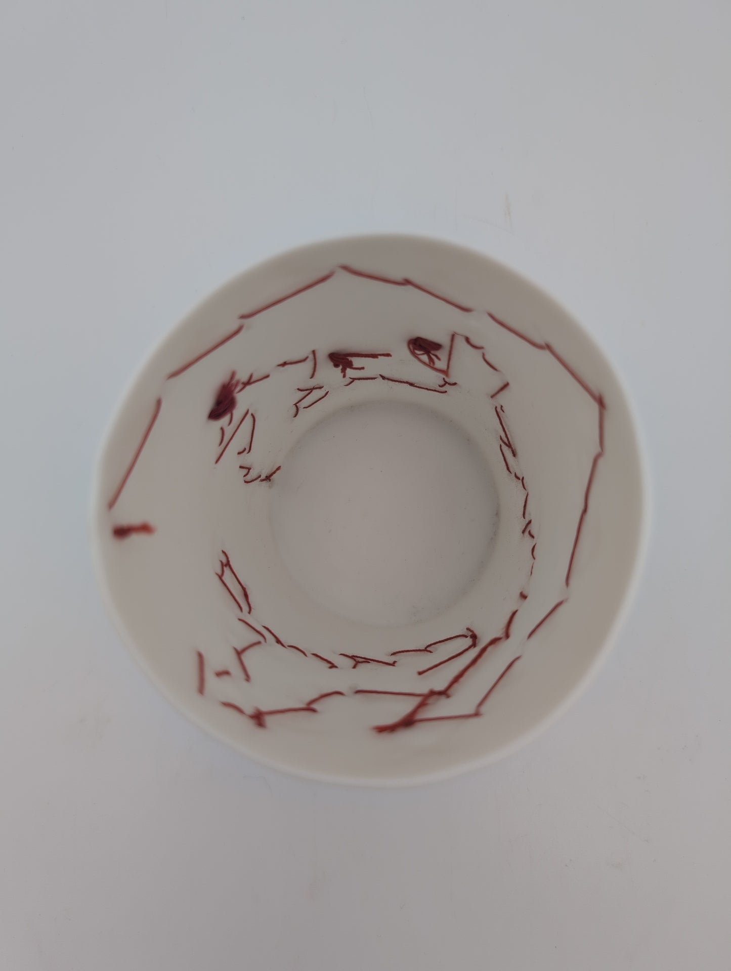 Porcelain beaker with silk hand stitching