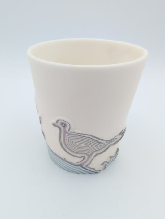 Porcelain beaker coloured lines bird