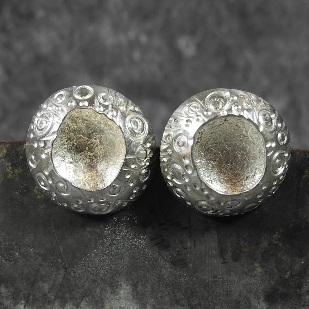 Silver echinoderm studs