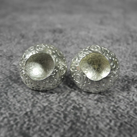 Silver echinoderm studs