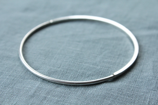Silver half-square bangle