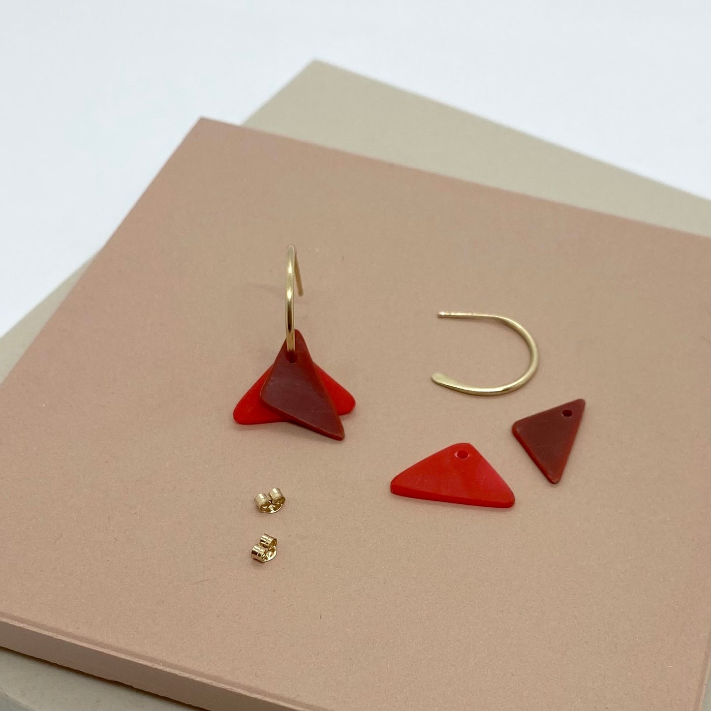 Gold Beach Clean Hoops with red ocean plastic triangle charms