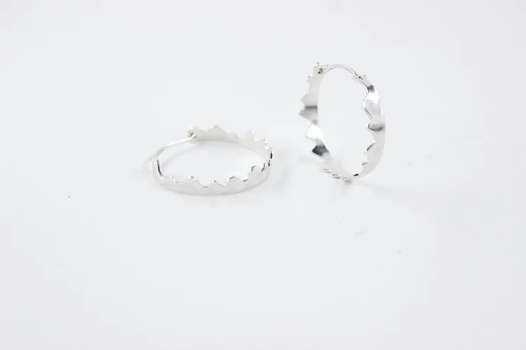 Silver wiggle hoops