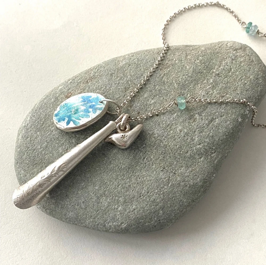 Long silver charms necklace