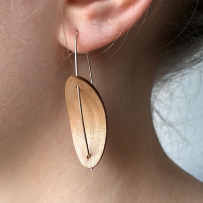 Oval earings - small.  Birch plywood and unhallmarked silver wire