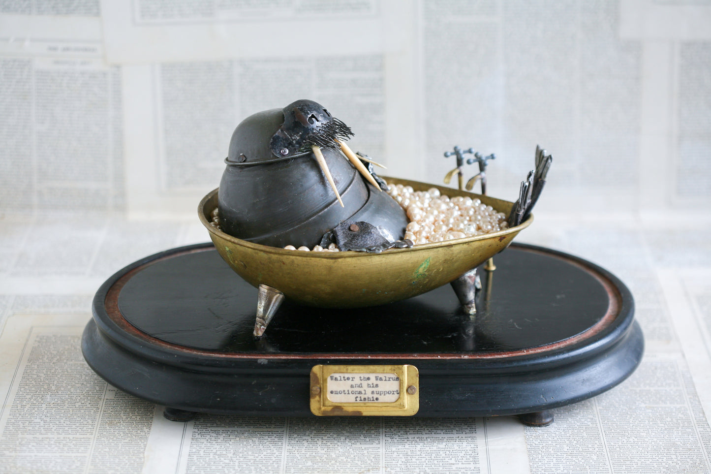 'Walter the walrus and his emotional support fishie' sculpture