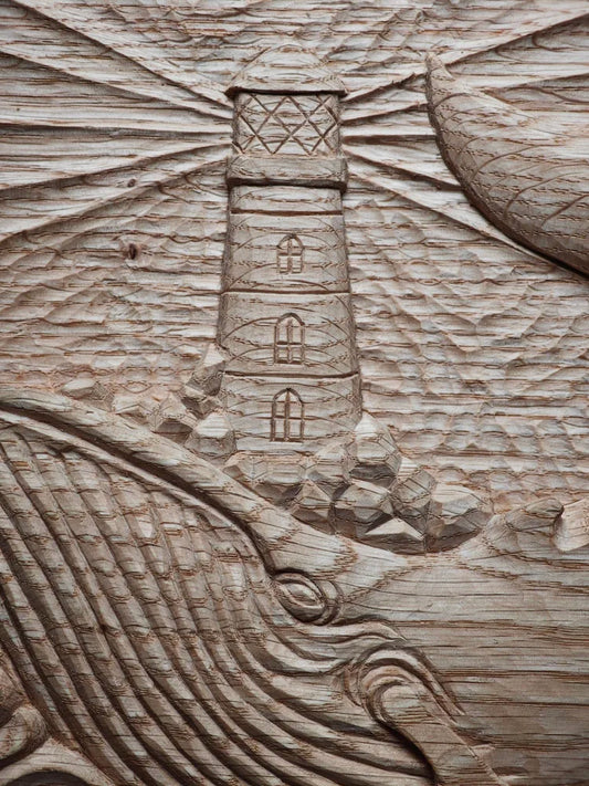 'Whale and Lighthouse' carved wooden panel