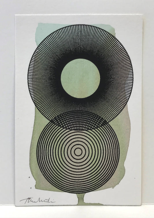 Two Small Geometric Screen Printed Circles Overlapping on top of Hand Painted Background of Pale Blue And Grey Tones