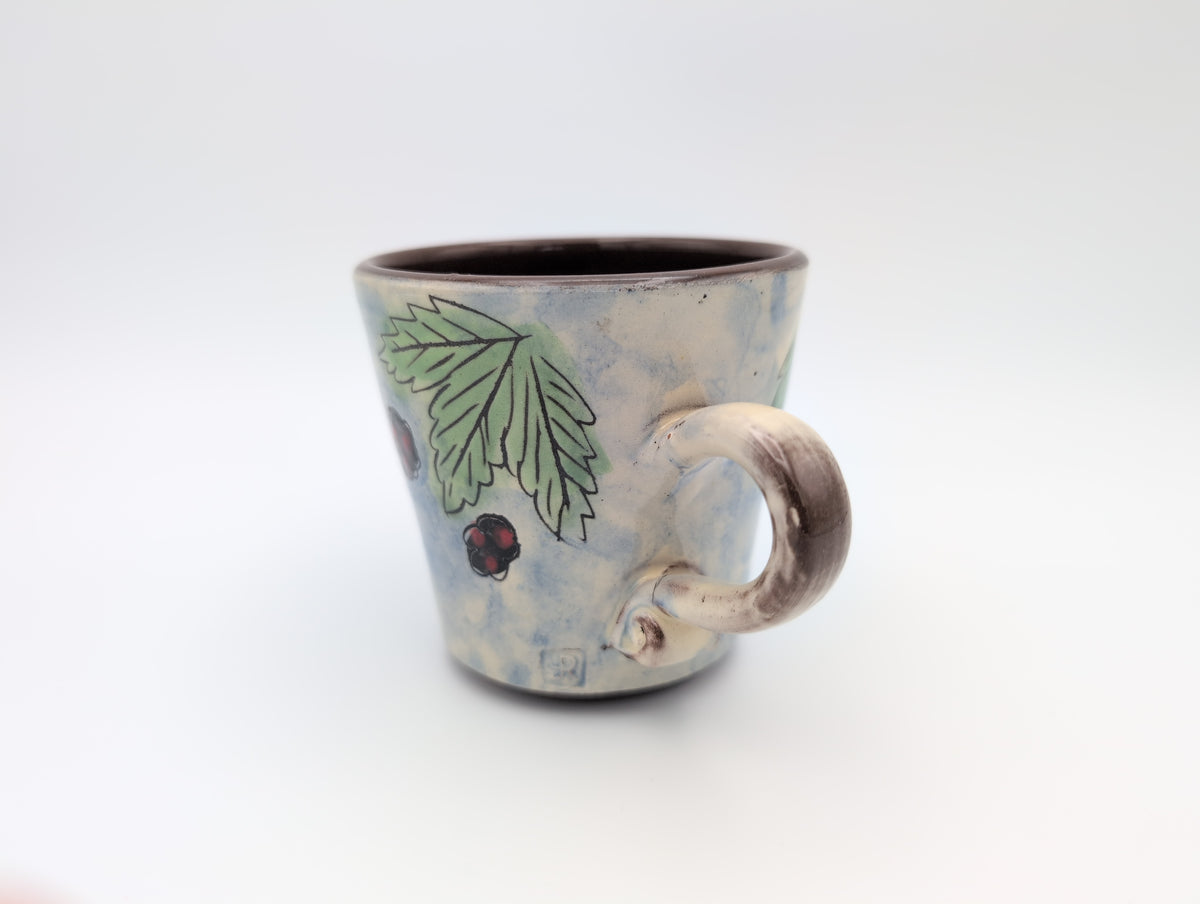 Hand thrown blackbird mug