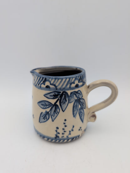 Hand thrown blue and white jug