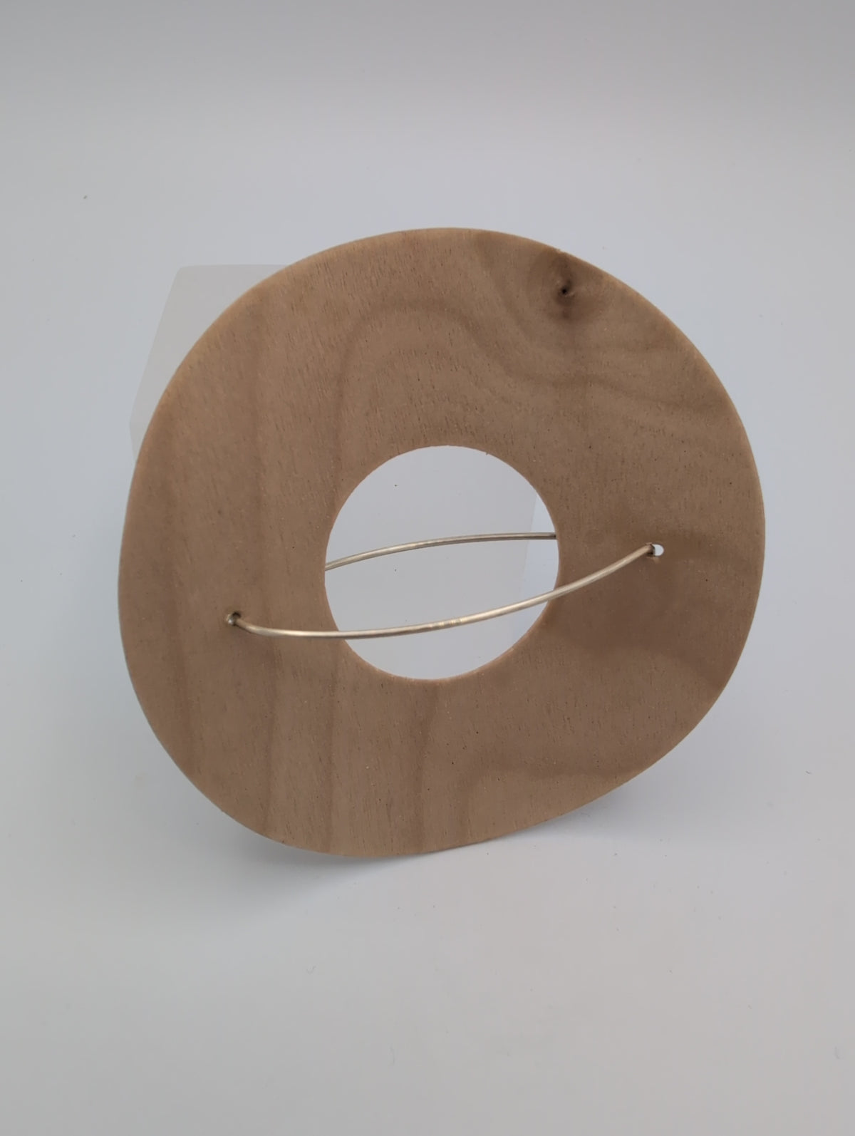 Donut Brooch.  Birch Plywood and unhallmarked silver wire.
