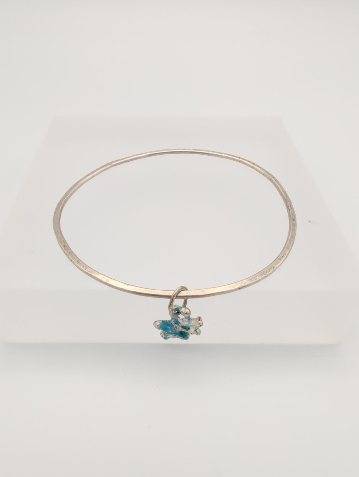 Recycled silver bangle with enamel charm