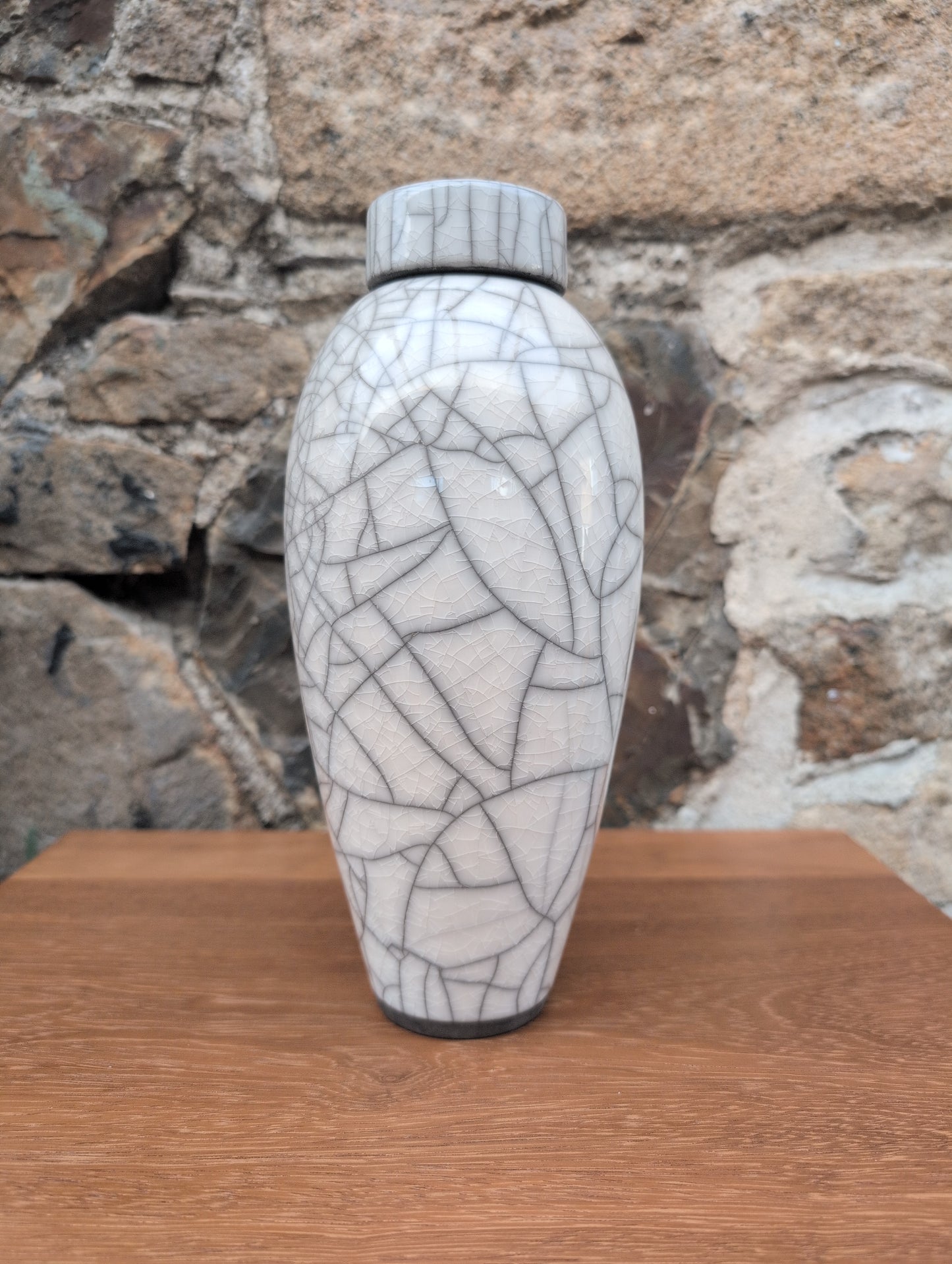 Medium raku lidded white jar