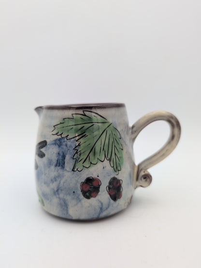 Hand thrown blackbird jug