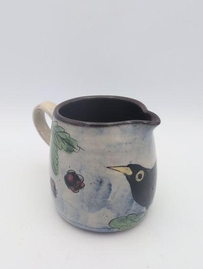 Hand thrown blackbird jug