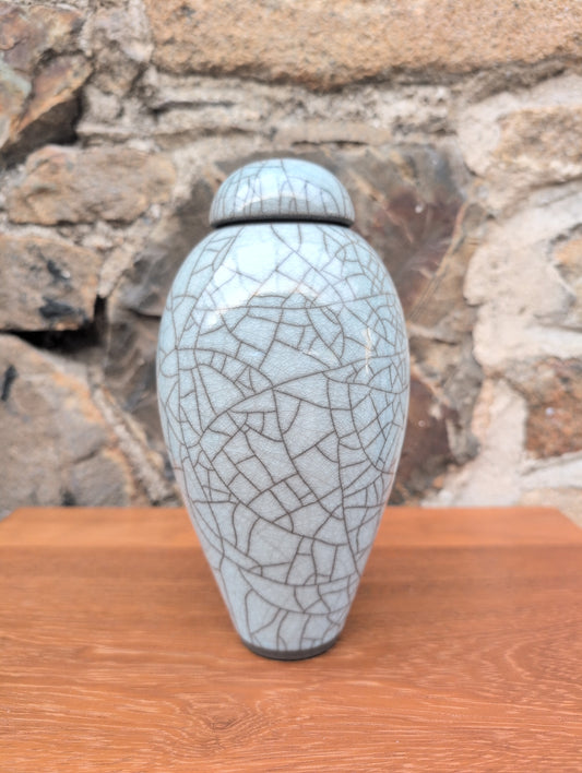Raku light turquoise lidded jar