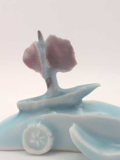 Porcelain boat and waves small sculpture