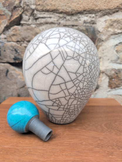 Large raku vase with turquoise stopper