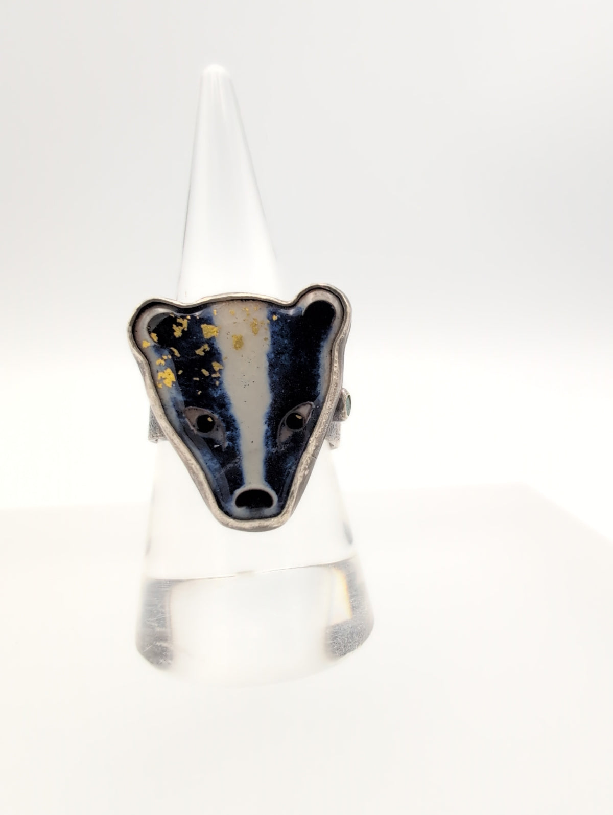 Enamel badger ring with emerald