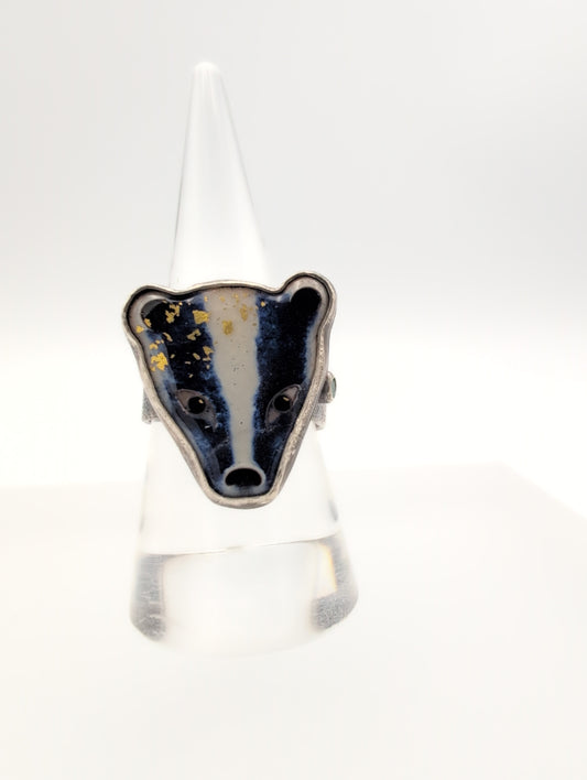 Enamel badger ring with emerald