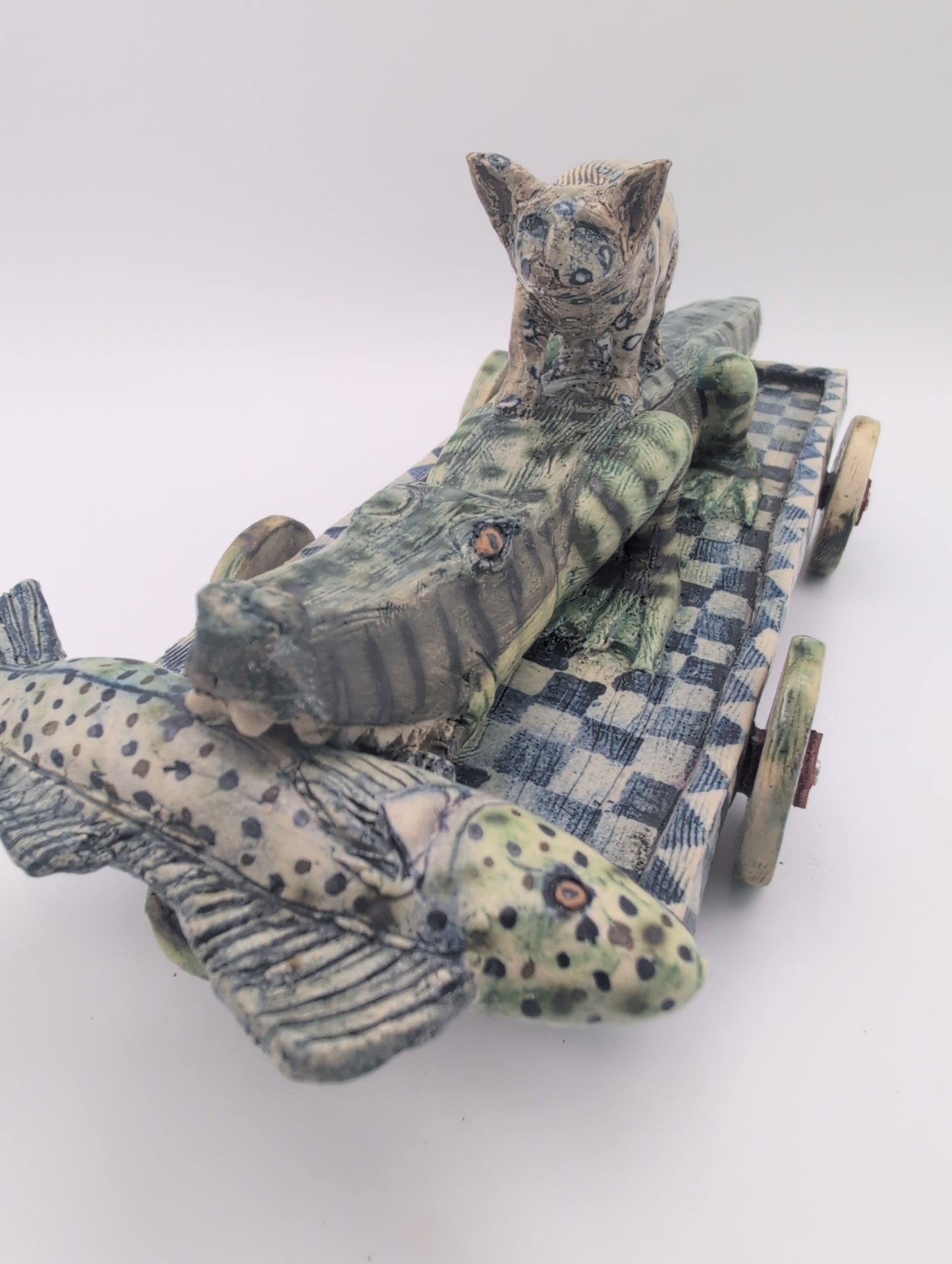 "The Fish Eaters" ceramic sculpture