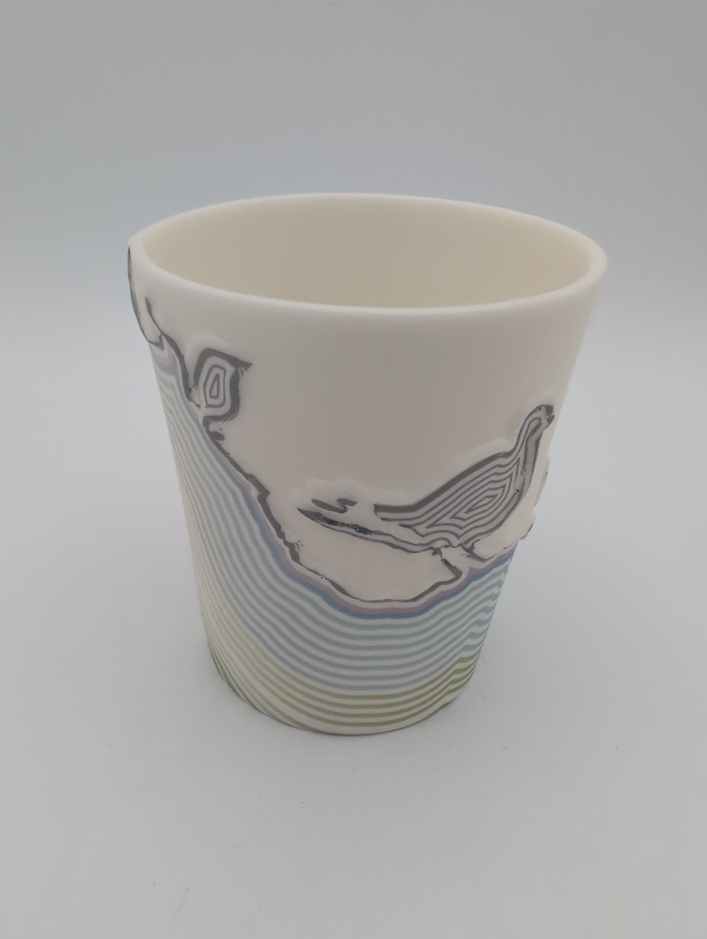 Porcelain beaker coloured lines bird