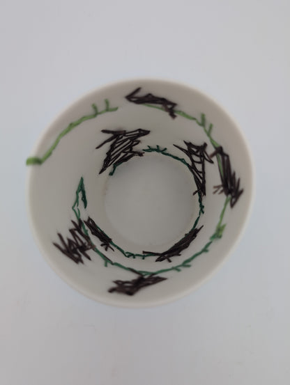 Porcelain beaker with silk hand stitching