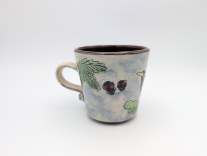 Hand thrown blackbird mug