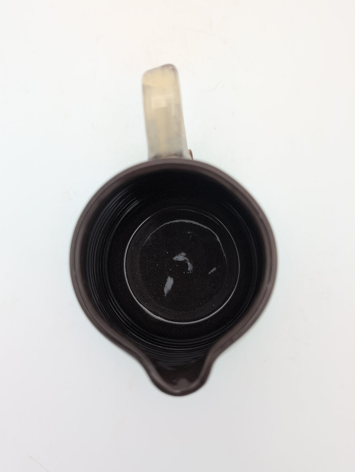 Hand thrown blackbird jug