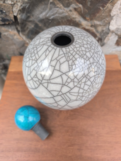 Large raku vase with turquoise stopper
